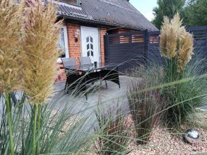 Ein Garten an der Unterkunft Ferienwohnungen Auetal