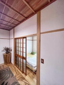Postel nebo postele na pokoji v ubytování Bighem Maison 2