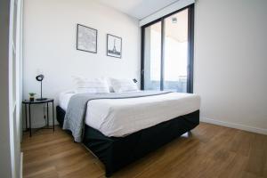 Ένα ή περισσότερα κρεβάτια σε δωμάτιο στο Nova Stays - 1BHK in Dome Green Soho II - Buenos Aires +55 φωτογραφίες