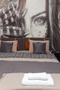 Postel nebo postele na pokoji v ubytování Red Clay Apartments City Club