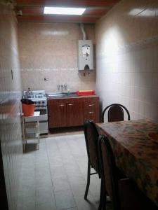 Kuchyň nebo kuchyňský kout v ubytování Mi casita de la suerte + 12 fotografií