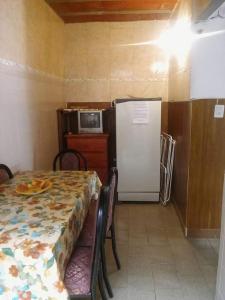 Kuchyň nebo kuchyňský kout v ubytování Mi casita de la suerte