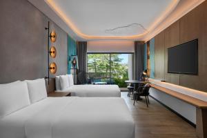 TV a/nebo společenská místnost v ubytování Renaissance Bali Nusa Dua Resort
