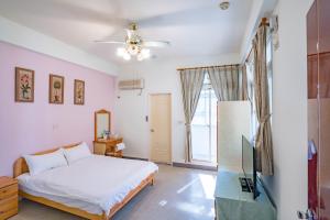 TV a/nebo společenská místnost v ubytování Hualien Travel + 13 fotografií