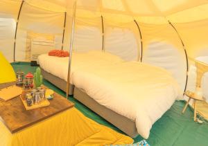 TACO GLAMPにあるベッド