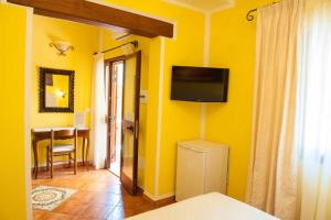 TV a/nebo společenská místnost v ubytování B&B Da Sabrina