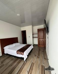 Postel nebo postele na pokoji v ubytování Hotel Beronica