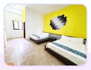 Postelja oz. postelje v sobi nastanitve New Summer Homestay