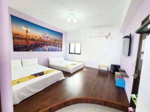 Postelja oz. postelje v sobi nastanitve New Summer Homestay