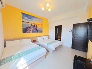 Postelja oz. postelje v sobi nastanitve New Summer Homestay