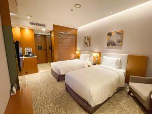 Hotel Skypark Central Seoul Pangyo房間的床