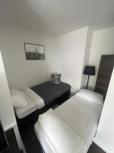 a room with two beds in a room with at Luxury 3-Beds Apartment in Yorkville with the Best City View in Downtown Toronto in Toronto