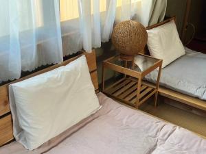 漁師宿三浦屋秀栄丸客房内的一张或多张床位