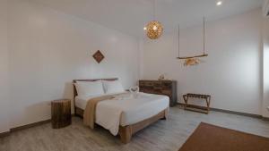 Postel nebo postele na pokoji v ubytování Lea Spa Hotel