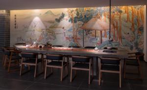 Fotografie z fotogalerie ubytování 重庆文里苗品茶艺术酒店Chongqing Jiangbei Airport Creative Park Store v destinaci Renhe