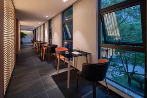 Balkón nebo terasa v ubytování 重庆文里苗品茶艺术酒店Chongqing Jiangbei Airport Creative Park Store