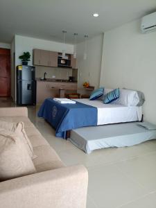 Postel nebo postele na pokoji v ubytování Cartagena Aparta Suite con Vista al Mar