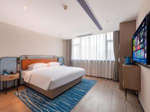 Kép Echarm Hotel Guangzhou Baiyun Airport Huadu Plaza Branch szállásáról Huatuban a galériában
