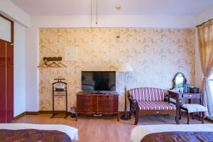 TV a/nebo společenská místnost v ubytování Hualien Travel