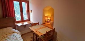 Postel nebo postele na pokoji v ubytování Adonis Guest House