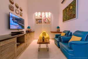 TV a/nebo společenská místnost v ubytování Casa De leo by Horizon Stays