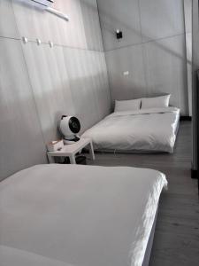 Cama o camas de una habitación en Evi Bnb