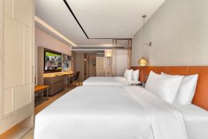 Φωτογραφία από το άλμπουμ του Home2 Suite by Hilton Lijiang Ancient Town σε Λιγιάνγκ