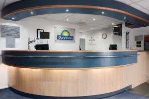 a view of a day inn reception counter in a waiting room at Days Inn by Wyndham Telford Ironbridge in Telford