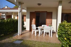 Patio lub wspólna przestrzeń na świeżym powietrzu w obiekcie Villaggio Loriana