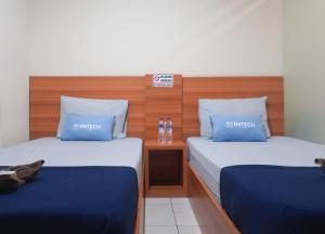 Krevet ili kreveti u jedinici u objektu Intech Hostel