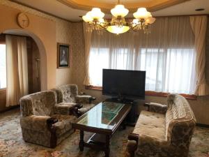TV a/nebo společenská místnost v ubytování Tomahouse