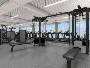 a gym with a lot of treadmills and machines at 2 Bedroom Home Perfect for Work & Family Short Long-Term Stays Easy Access to Manchester, Oldham, Bury in Rochdale