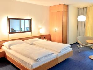Postel nebo postele na pokoji v ubytování Residence Zug