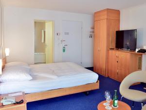 Postel nebo postele na pokoji v ubytování Residence Zug