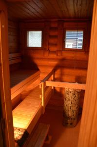 an inside view of a cabin with two bunk beds at Secret Lapland - Luxury Villa Siida with Northern Lights Hut in Pyhätunturi