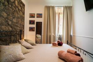 Postel nebo postele na pokoji v ubytování Casa Carly Taormina