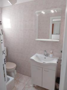 Kúpeľňa v ubytovaní Apartments Josip