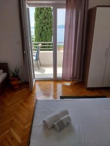 Posteľ alebo postele v izbe v ubytovaní Apartments Josip