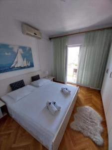 Posteľ alebo postele v izbe v ubytovaní Apartments Josip