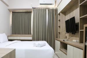 Φωτογραφία από το άλμπουμ του Elegant and Nice Studio Room at Citra Living Apartment By Travelio στην Τζακάρτα