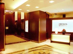 a lobby with a presentation in a building at Osaka Dai-ichi Hotel in Osaka