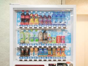 a refrigerator filled with lots of different types of drinks at KOIJIGAHAMA KUROSHIO in Tahara