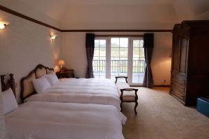 GRAND VERDE RESORT客房内的一张或多张床位