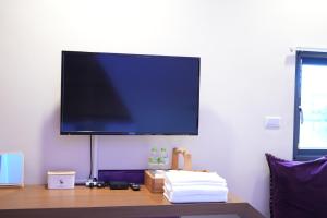 TV a/nebo společenská místnost v ubytování Blue Tears