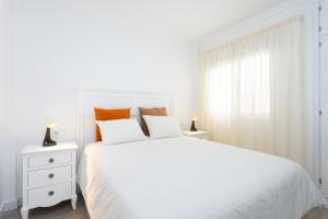 Ένα ή περισσότερα κρεβάτια σε δωμάτιο στο Home2Book Ocean Breeze Apt, Puertito de Güimar