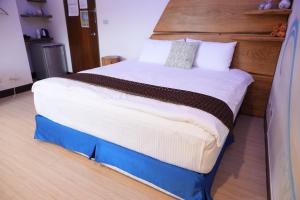 Postel nebo postele na pokoji v ubytování Blue Tears