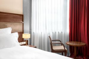 Letto o letti in una camera di Movenpick hotel Sarajevo