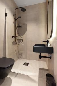 Koupelna v ubytování Bjugn Hotell + 32 fotografií