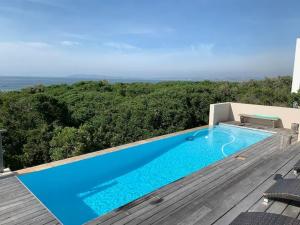 Πισίνα στο ή κοντά στο Home By The Sea