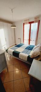 Postel nebo postele na pokoji v ubytování Casa di Minù